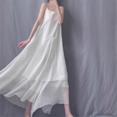 不规则飘逸吊带连衣裙女夏季设计感小众森系文艺范气质大摆长裙子